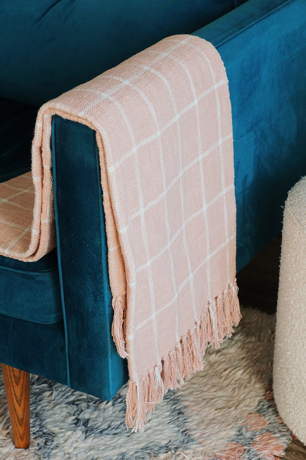 pink and white handwoven throw