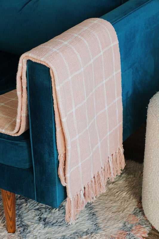 pink and white handwoven throw