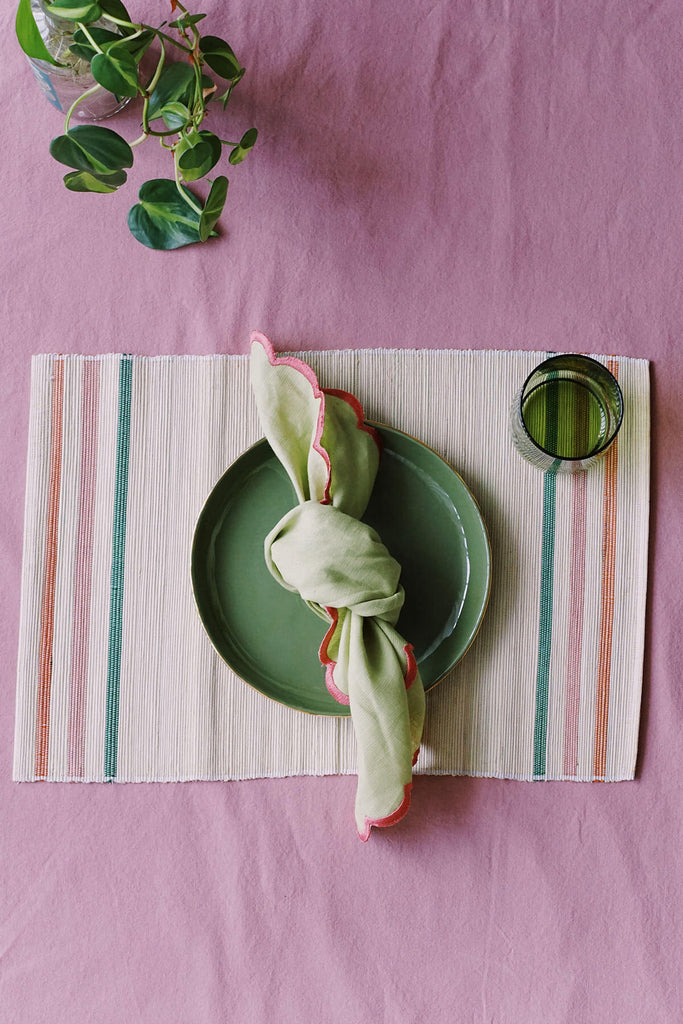 woven placemats with green, pink & orange stripes