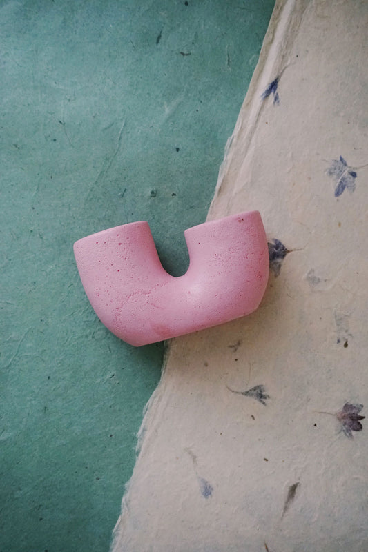 pink taper candle holder via wallflower shop