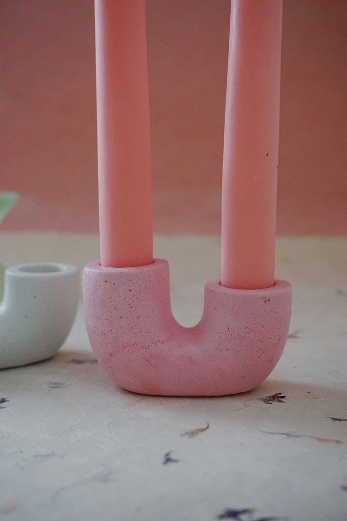 pink taper candle holder via wallflower shop